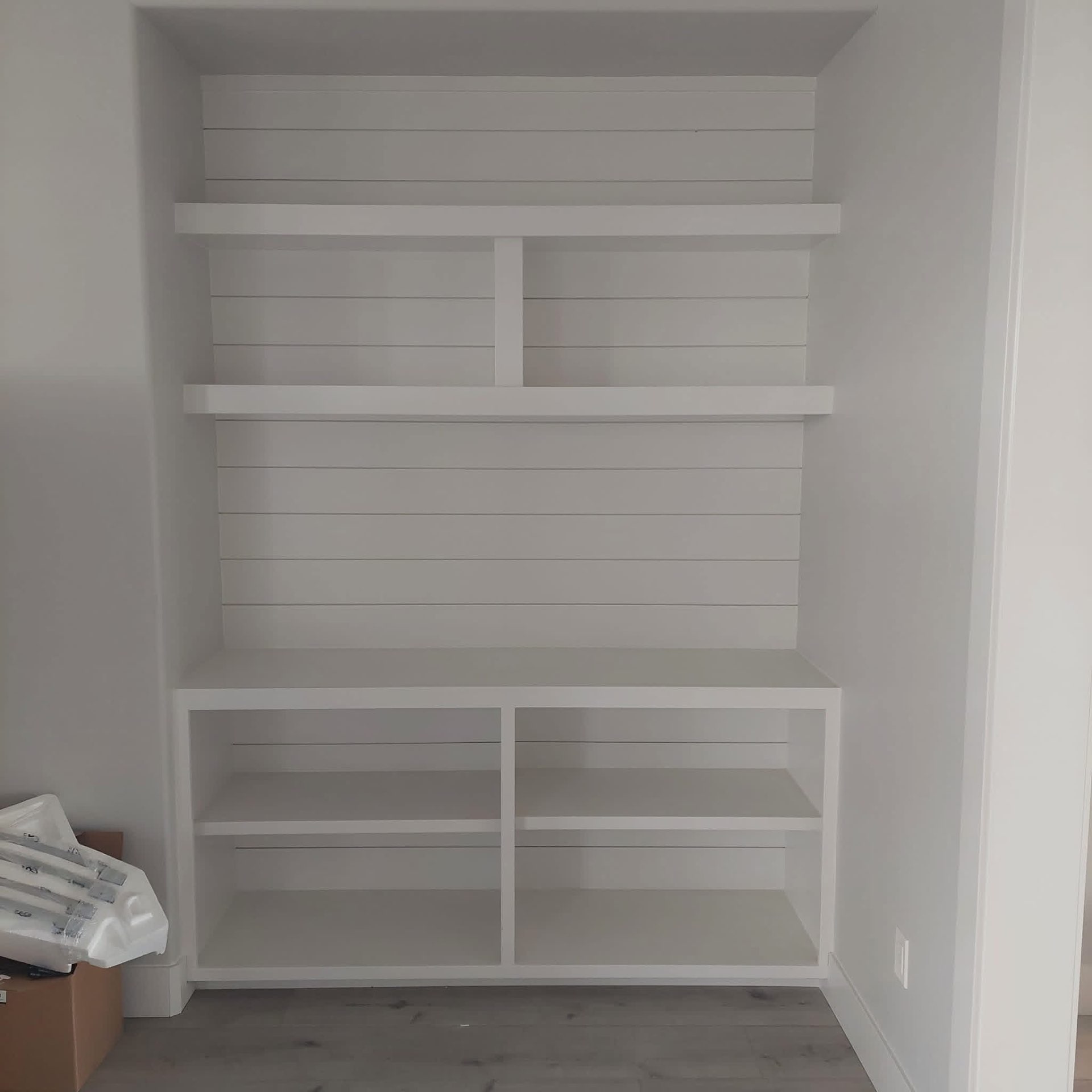 Built-in shiplap shelving cabinet