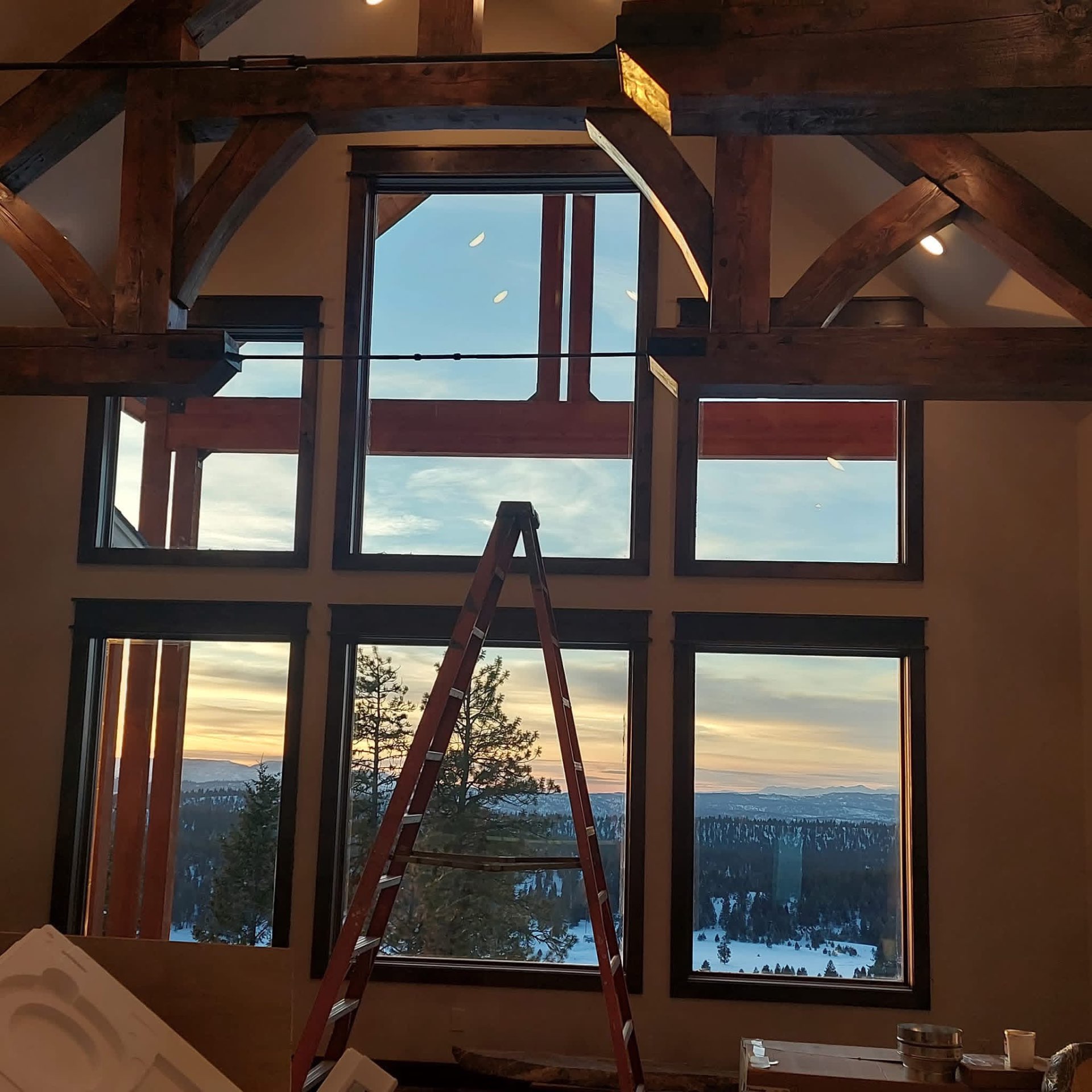 Dark window casings with timber beams